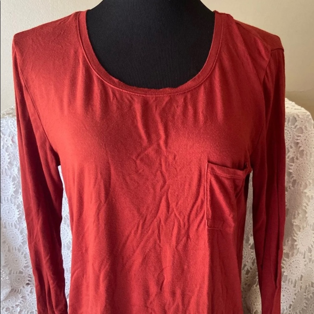 Rust colored long sleeve size M